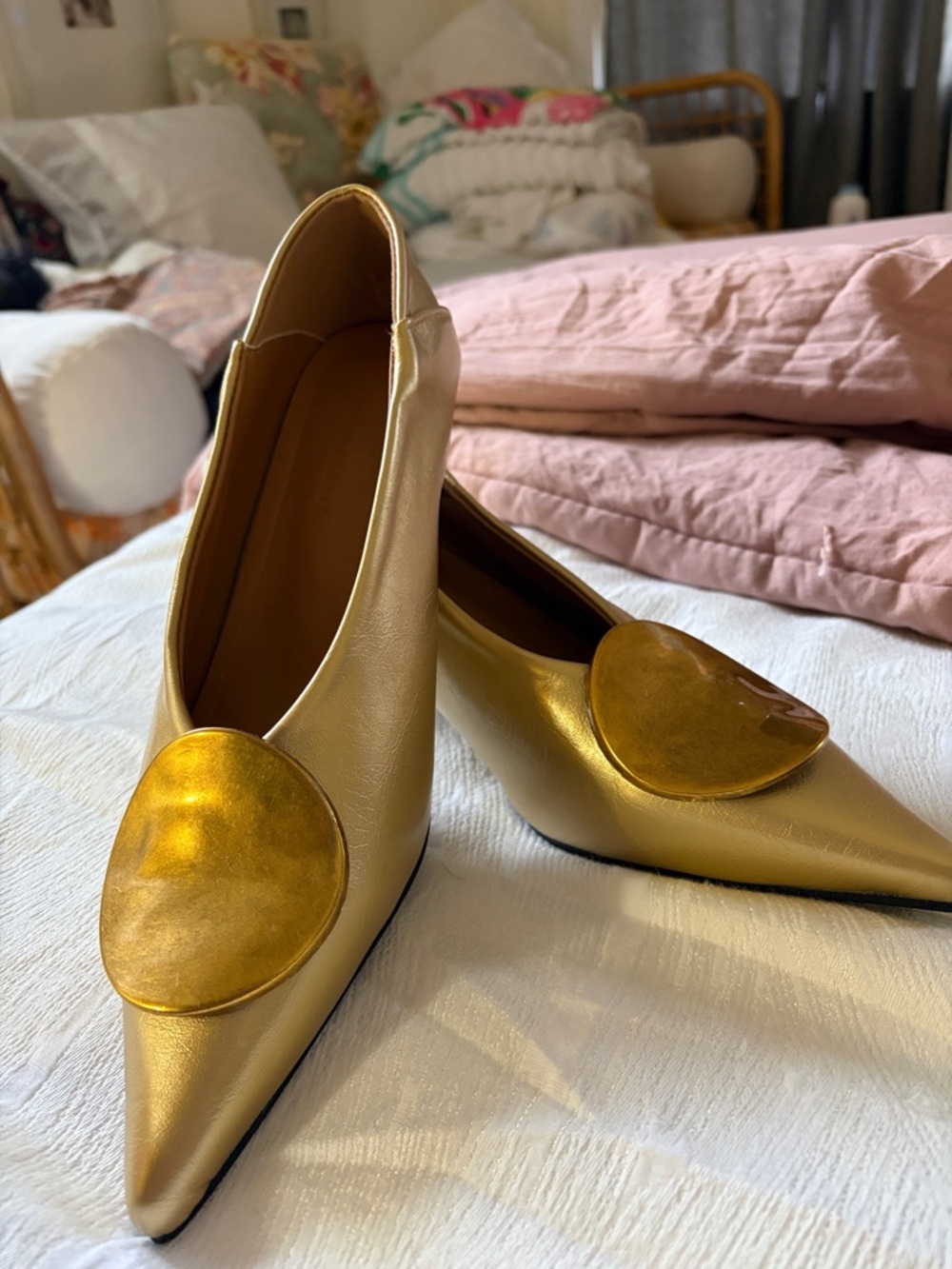 Gold Pointed Toe Flats with Large Disc Accent